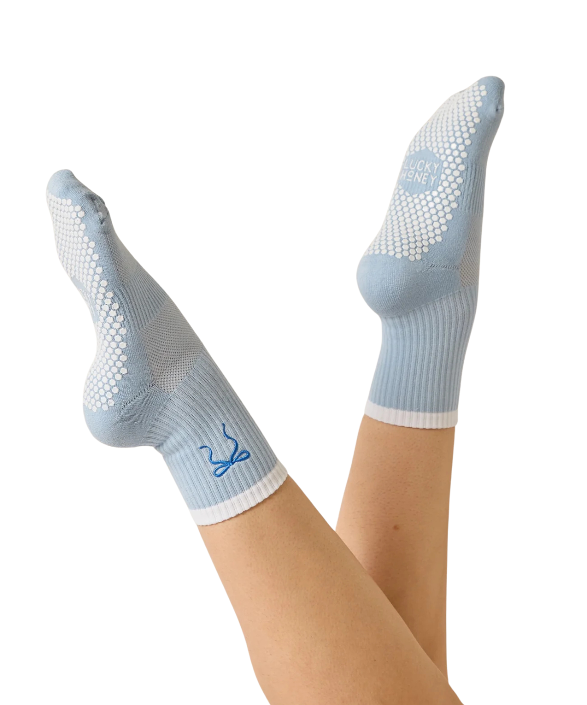 Babyblaue Crew Grip Socke mit auffälliger royalblauer Schleife auf der Vorderseite