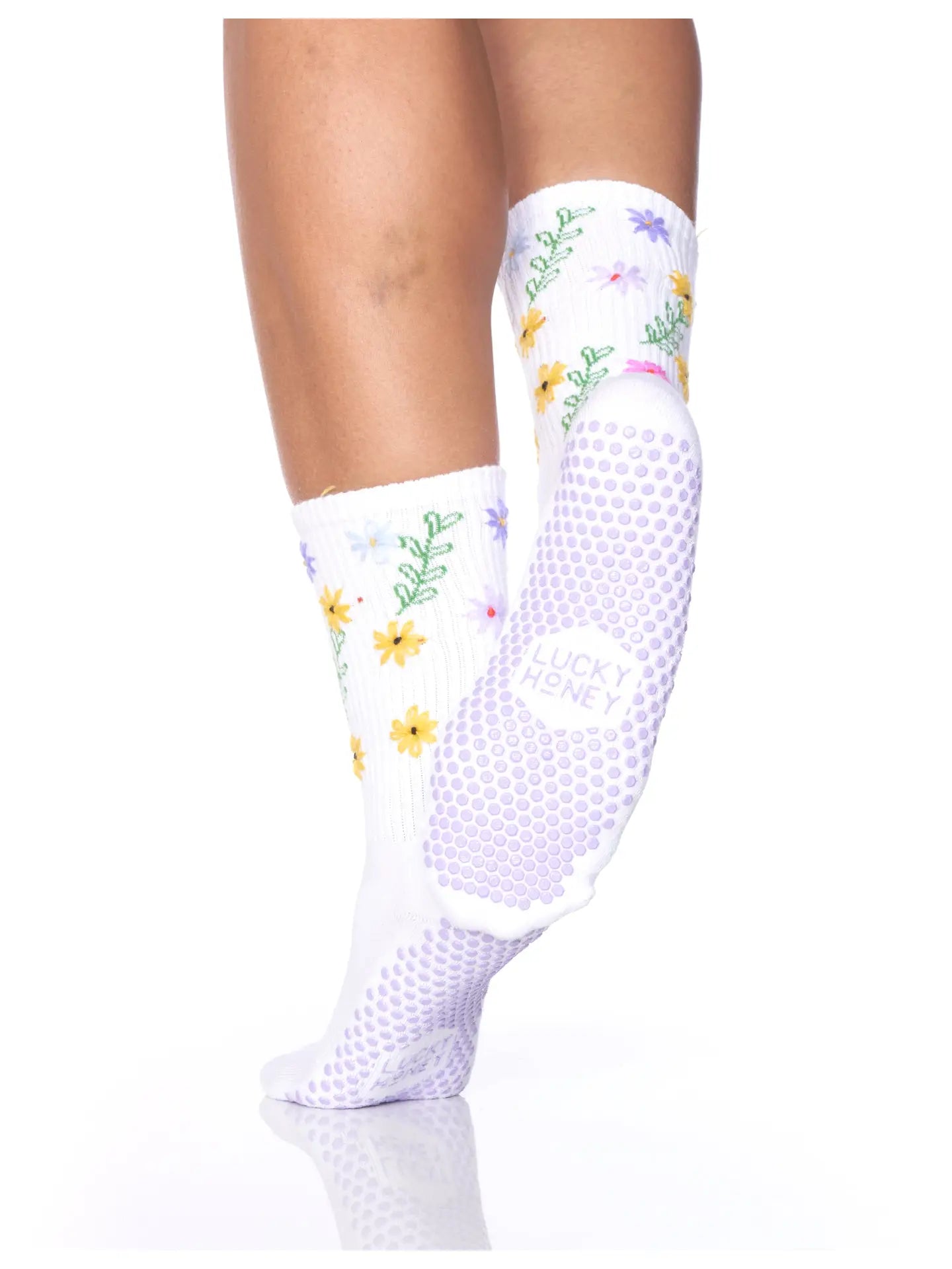 Detail: florale Stickerei & strukturierte Grip-Sohle