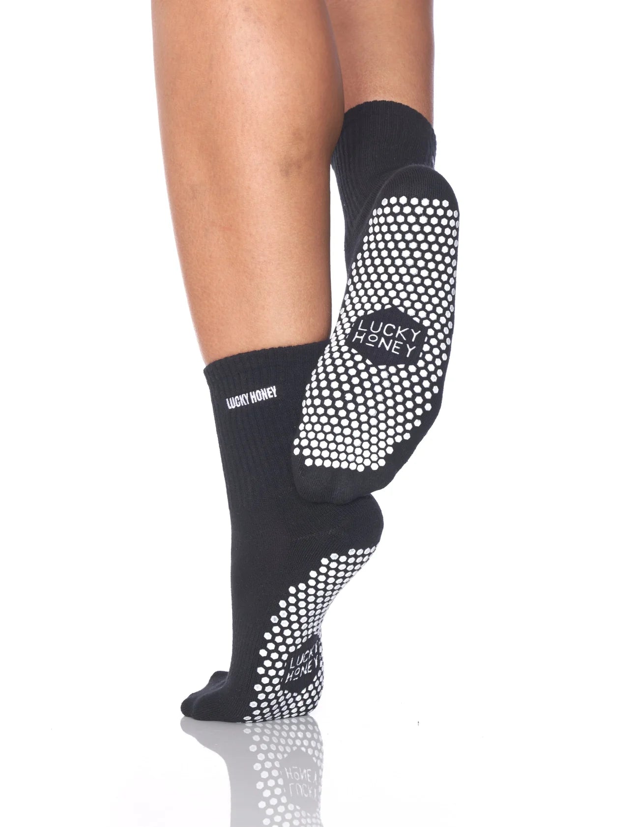 Vielseitige schwarze Pilates Socke mit Anti-Rutsch-Technologie für sicheren Halt