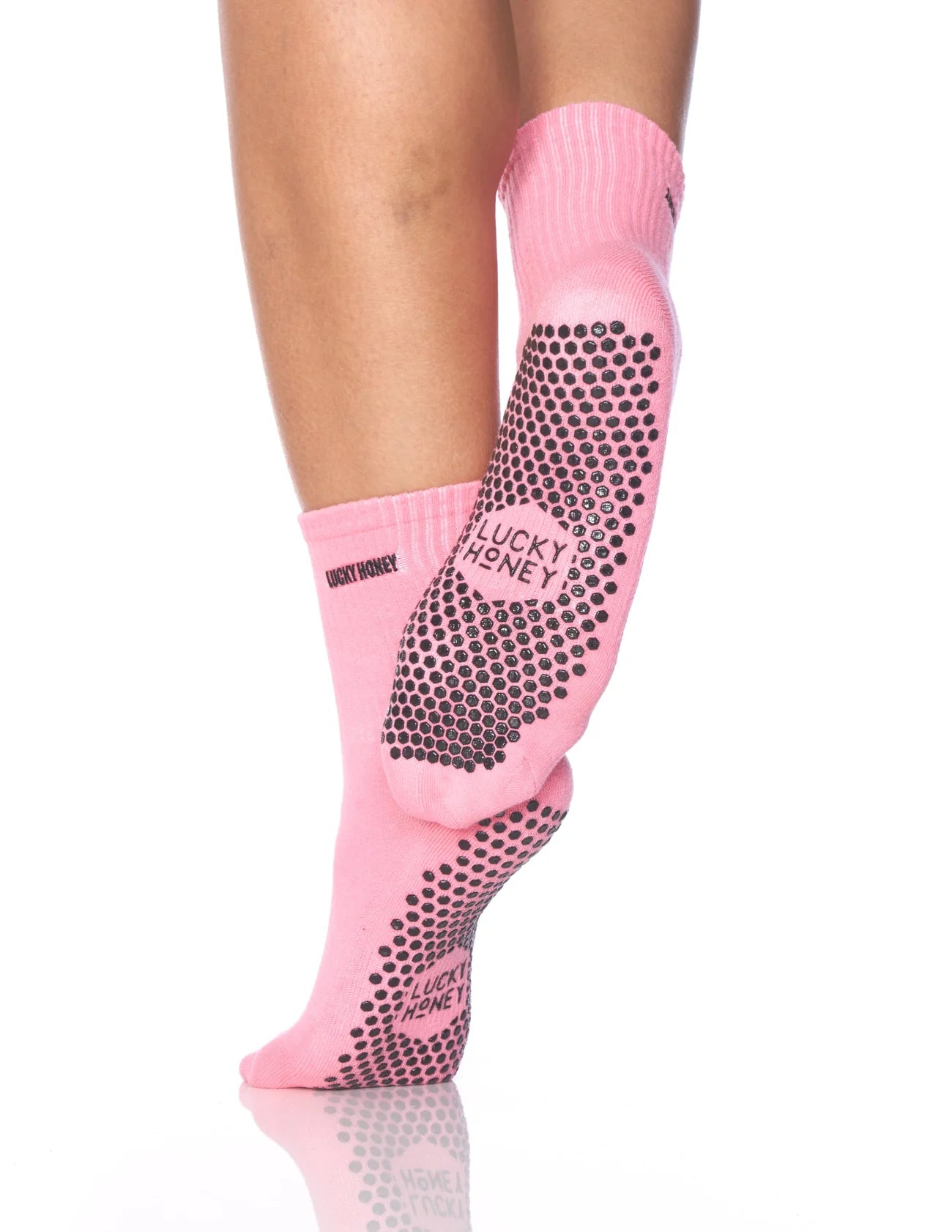 Stylische pinke Grip Sock mit perfektem Halt für Barre & Pilates