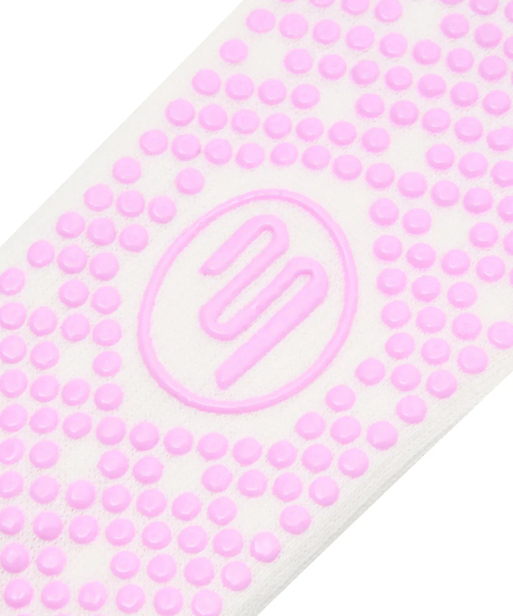 Detailaufnahme der rosa PVC-Grip-Sohle mit „Hug Me“-Design